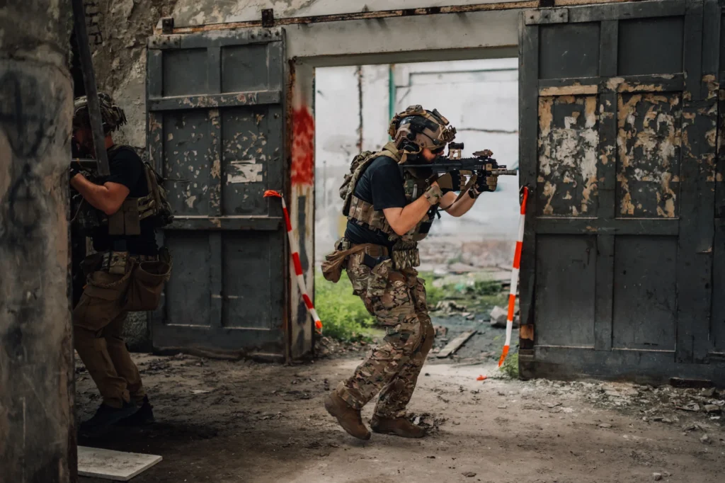 full length of air soft player with sniper going i 2026 03 09 02 52 45 utc
