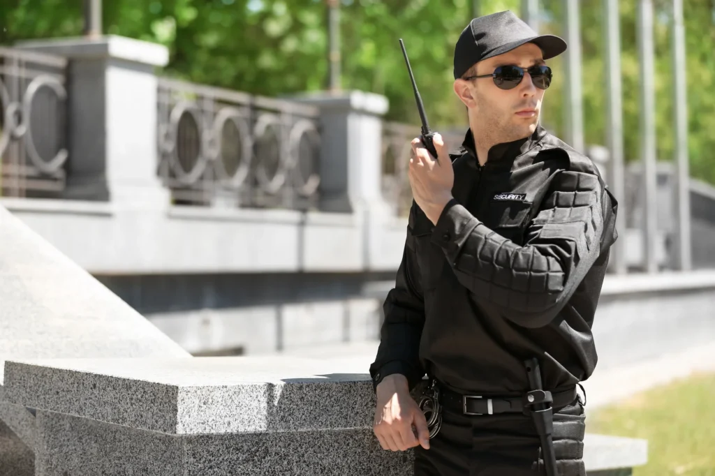male security guard using portable radio transmitt 2026 03 27 02 59 08 utc